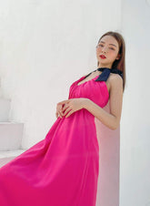 Silk halter neck maxi dress with contrast tie and gathered bust detail